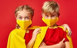 two children wearing clothing