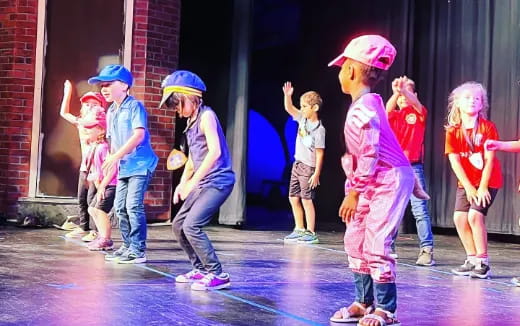 a group of children dancing