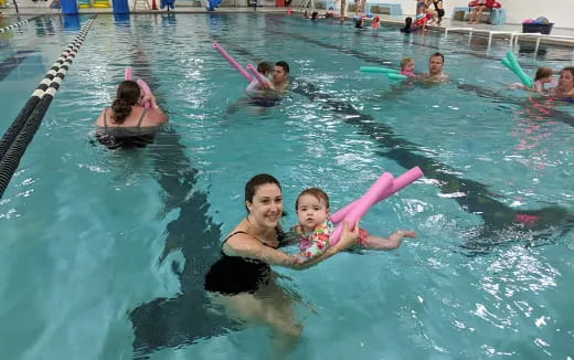 a group of people in a pool