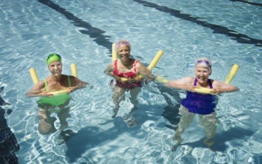 a group of people in a pool