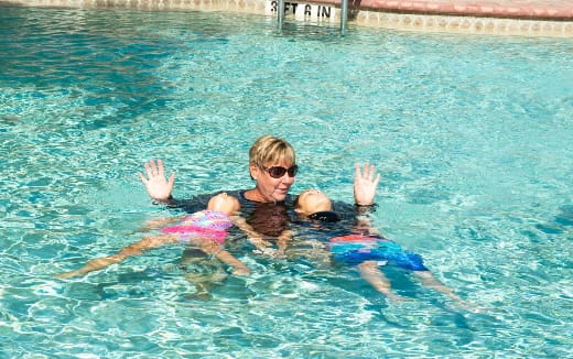 a man and a woman in a pool