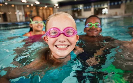 a group of people in a pool
