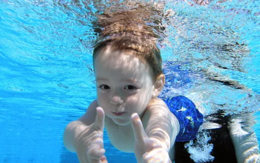 a child in a pool