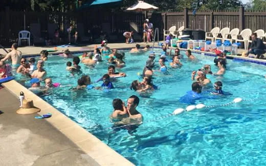 a group of people in a pool