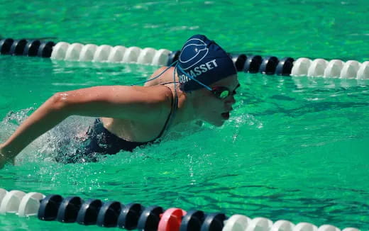 a person swimming in a pool