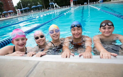 a group of people in a pool
