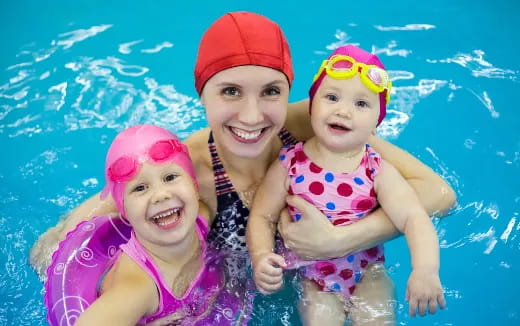 a group of children in a pool