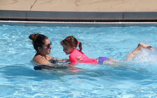 two women in a pool