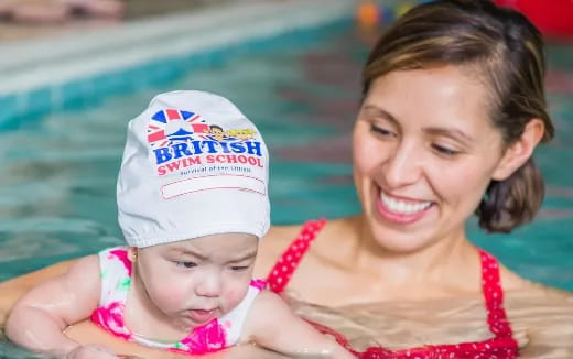 a person holding a baby