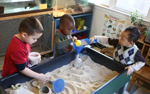 a group of children painting