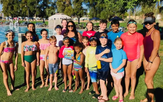 a group of people posing for a photo