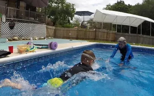 a couple of people in a pool