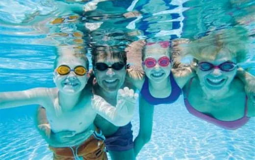 a group of people in a pool