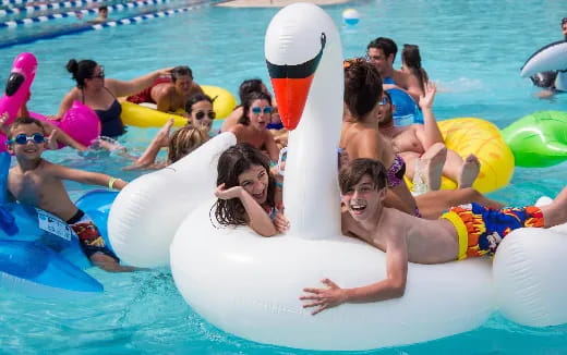 a group of people in a pool