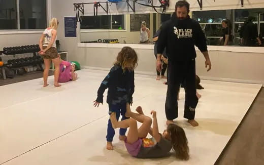 a group of children playing on the floor