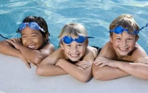 a group of people in a pool