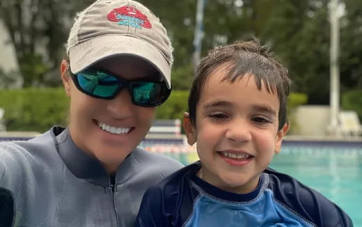 a couple of boys smiling