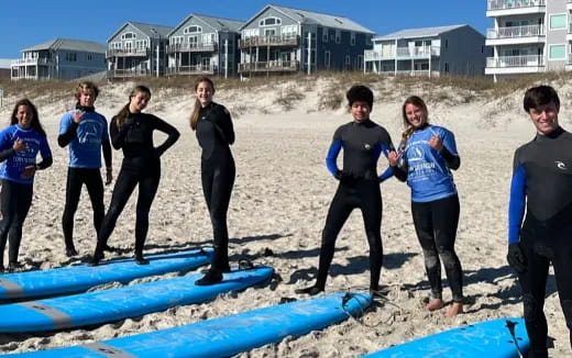 a group of people on a beach