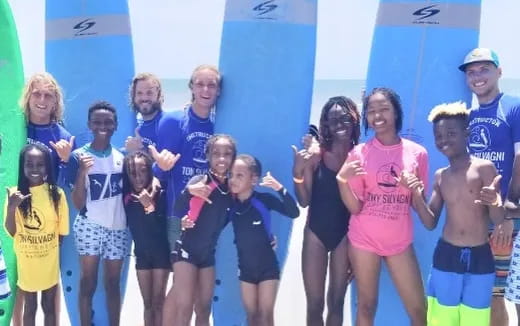 a group of people posing for a photo