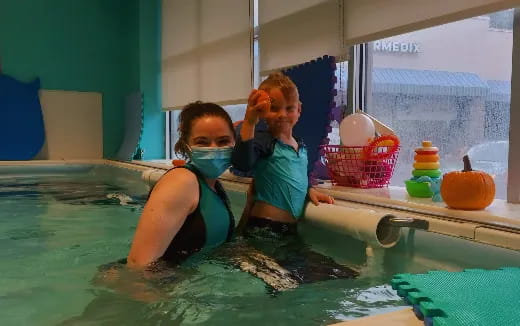 a couple of women in a pool