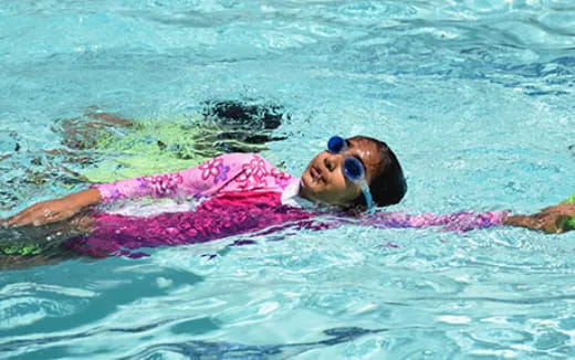 a person swimming in water