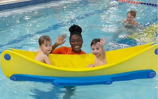 a group of people in a pool