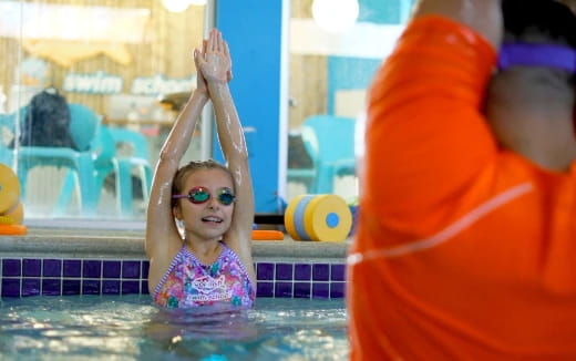 a girl in a pool