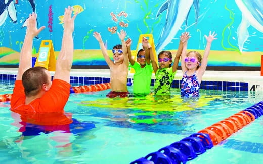 a group of people in a pool