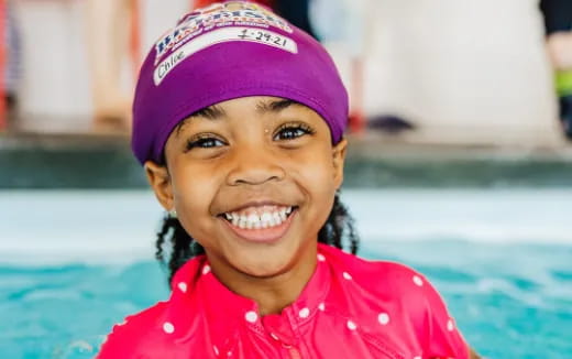 a girl in a pink shirt