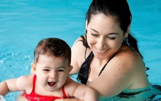 a person and a child in the water