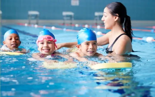 a group of people in a pool