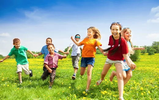 a group of children jumping in the air