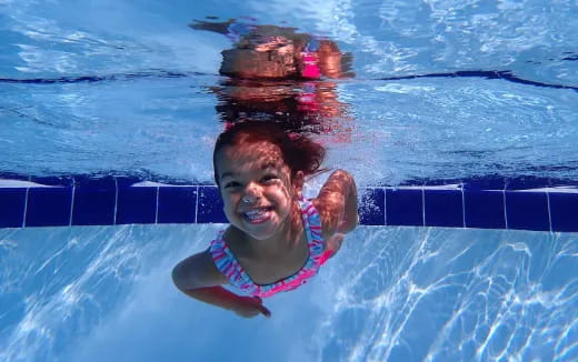 a person in a pool