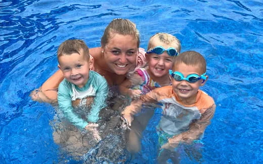 a group of kids in a pool