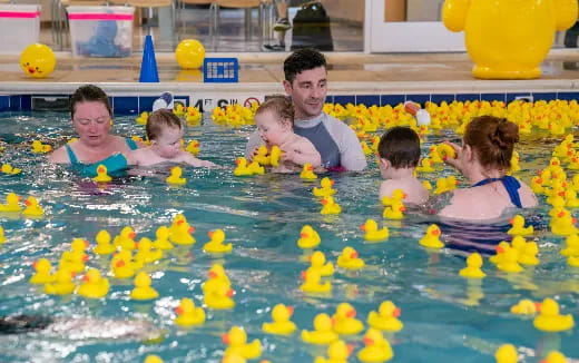 a group of people in a pool
