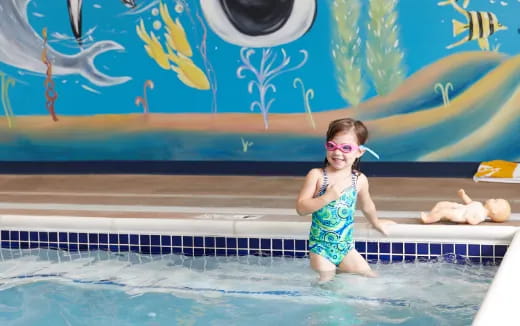 a girl in a pool