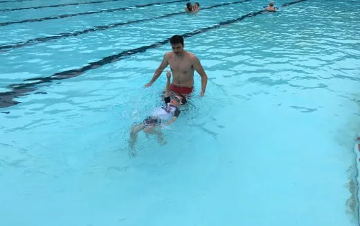 a man in a pool