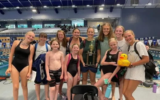 a group of women posing for a photo