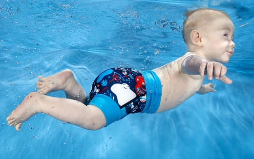 a baby in a pool