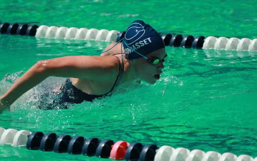 a person swimming in a pool