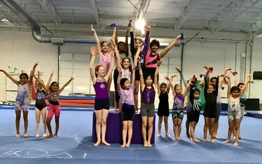a group of girls posing for a photo