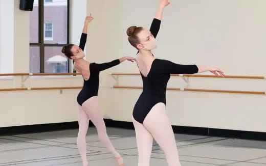 a couple of women dancing