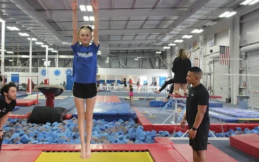 a person standing on a mat