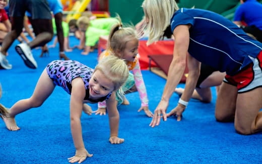 a group of girls doing yoga