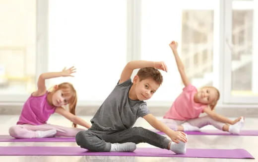 a group of children exercising