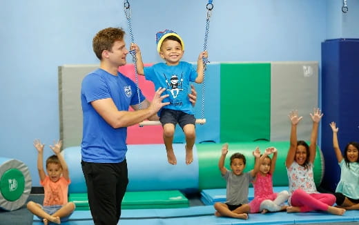 a man and a group of children