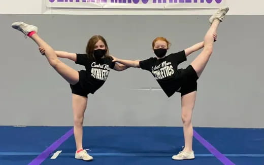 a couple of women dancing