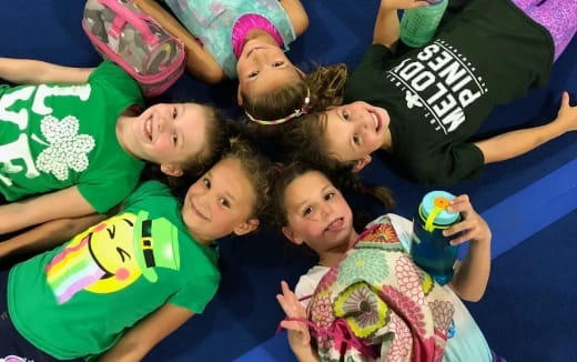 a group of children posing for a photo