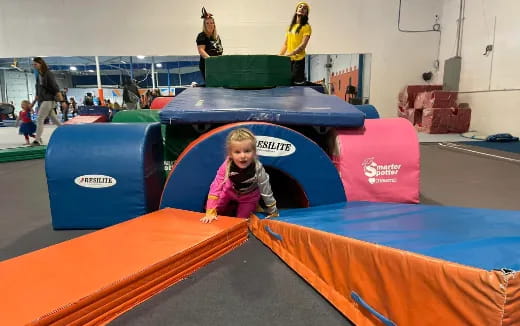 a child in a toy car