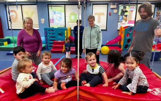 a group of children sitting on the floor